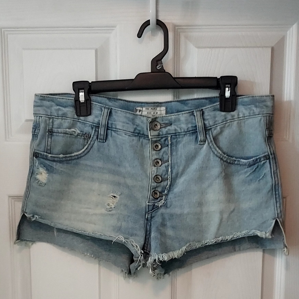 Free People size 28 button fly distressed denim shorts